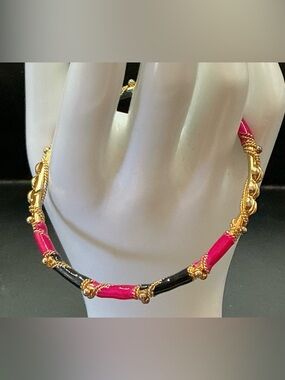 GOLD TONE PINK AND BLACK ENAMEL BANGLE BRACELET